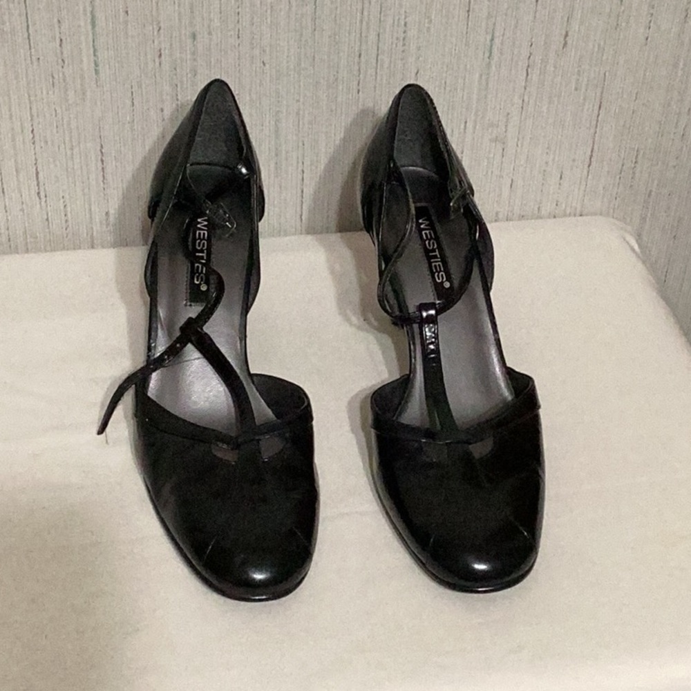 Westies black heels.